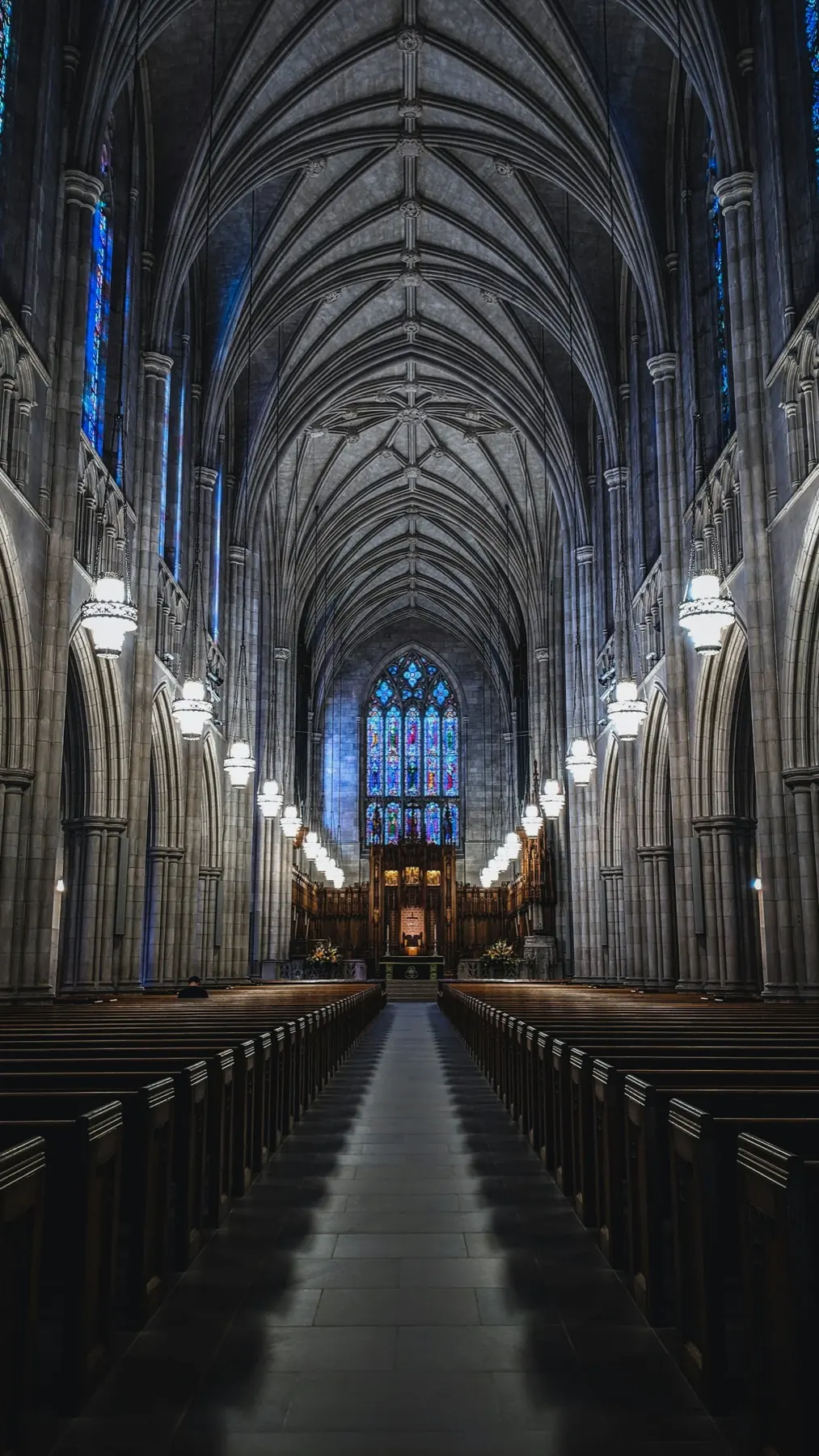 The long center aisle of a quiet sanctuary